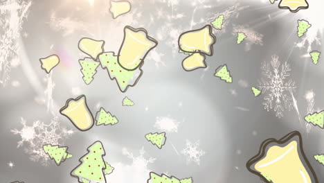 animation of falling green christmas trees, snowflakes and yellow bells on grey background