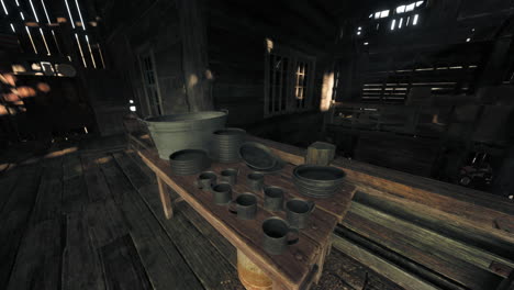 old rustic interior with metal mugs and plates on a wooden table