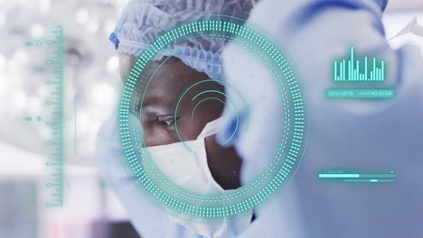 animation of scope scanning and data processing over african american surgeon in operating theatre