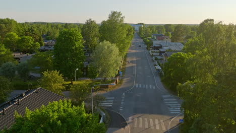 aerial view flying low over a quiet street in the suburbs of northwest helsinki