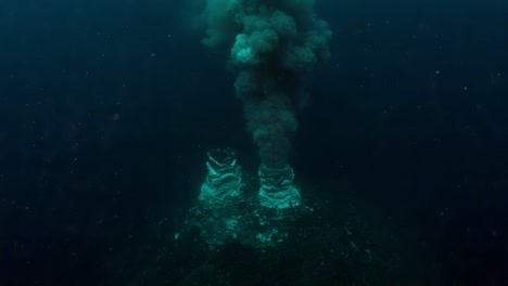 underwater eruption: a profound view of volcanic activity beneath the ocean's surface, showcasing bubbling ash clouds and eruptive dynamics