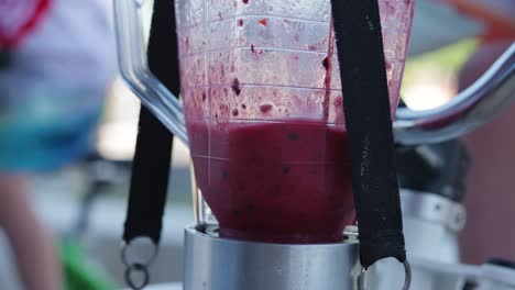 smoothie in making at a smoothie bike with blurred background