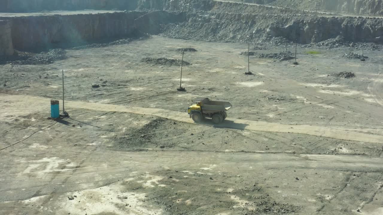 Granite quarry. Extraction of granite. Open cast mine. Mining industry. Stone Quarrying - Aerial view