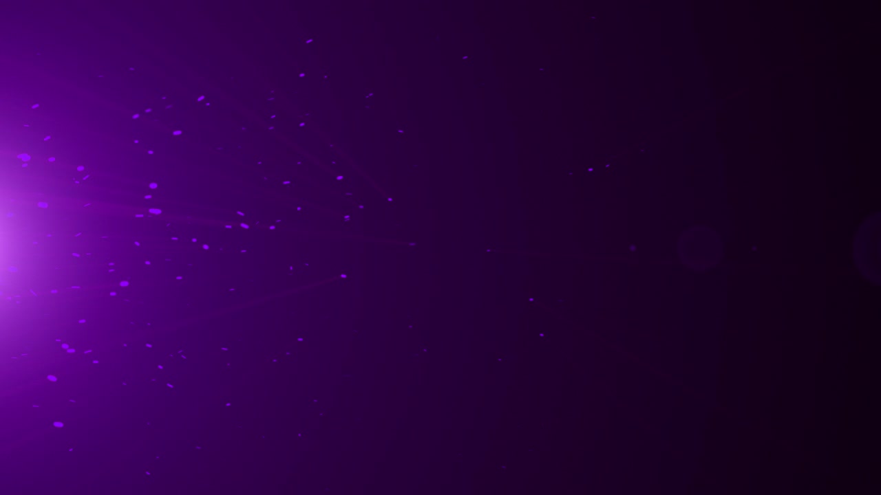 animación muy detallada de chispas púrpuras producidas por un emisor fuera de la pantalla.