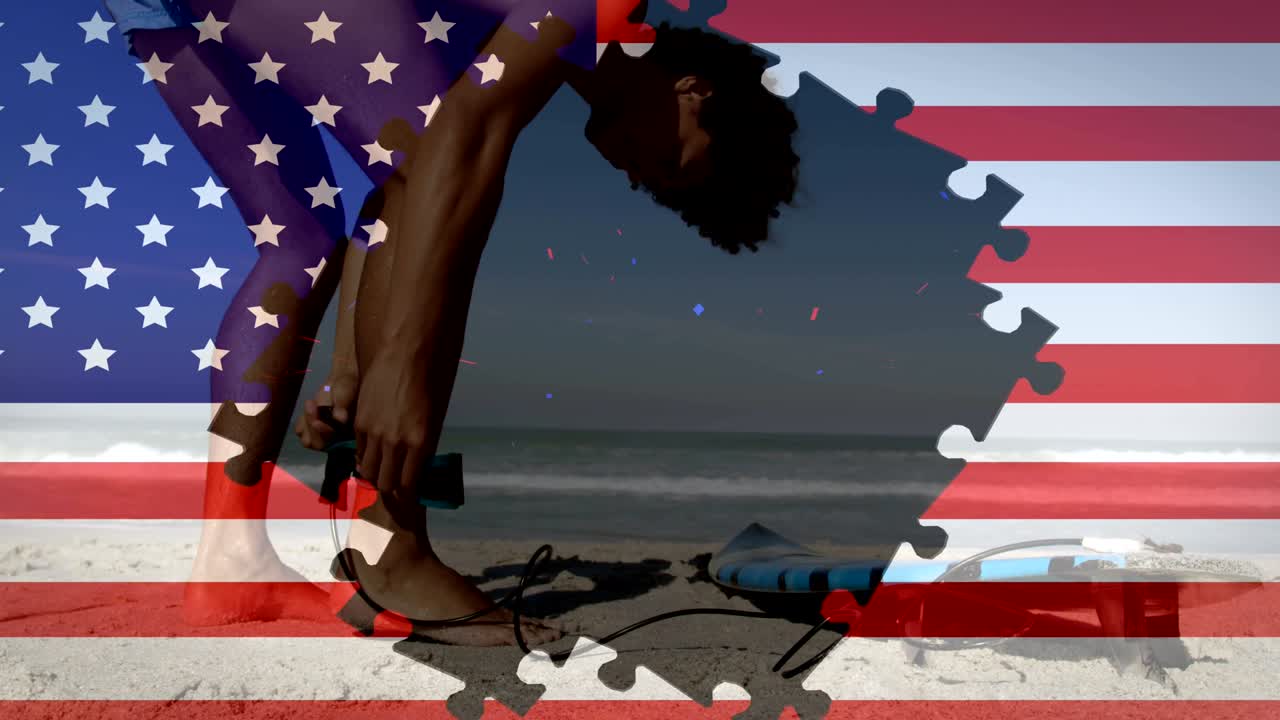 animación de la bandera estadounidense ondeando con rompecabezas que revelan a un hombre de raza mixta en la playa