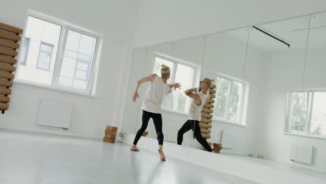 a man dancing in a dance studio