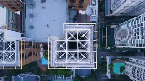 aerial view of a city with high-rise buildings under construction