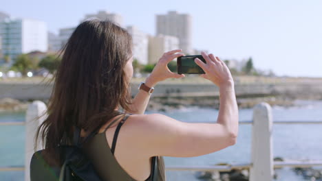 Woman,-beach-and-phone-for-picture