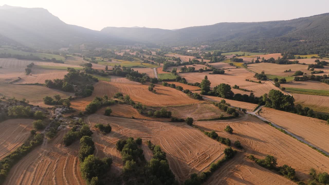 Approaching drone shot showing cultivated farmlands in a Spanish countryside in Valderama, Burgos province in Spain.