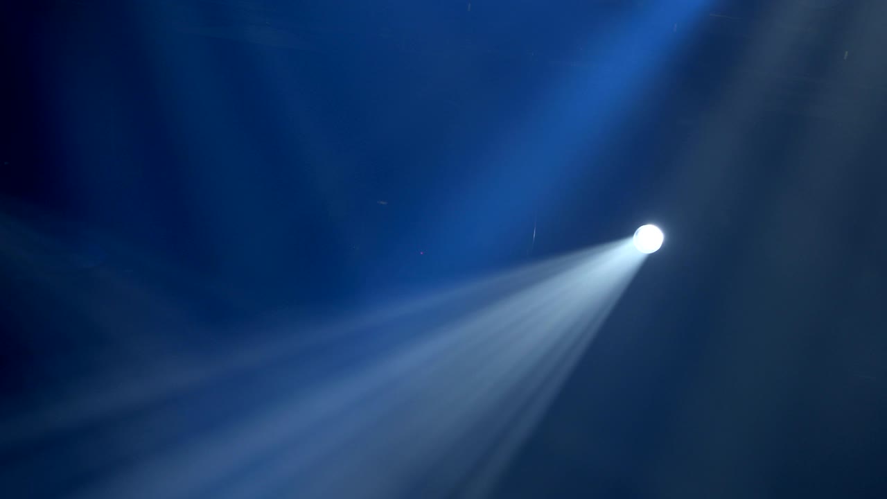 The spotlight through the smoke on stage. Lighting equipment. Effect Lights. Scanner. Color Changers. Moving Yoke. Moving Head