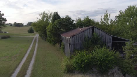 slow orbit to the left around an old abandoned barn