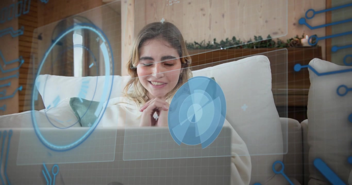 Mujer sosteniendo una tarjeta cerca de la cámara y tocando el trackpad, con gráficos financieros deslizándose, verificando el pago