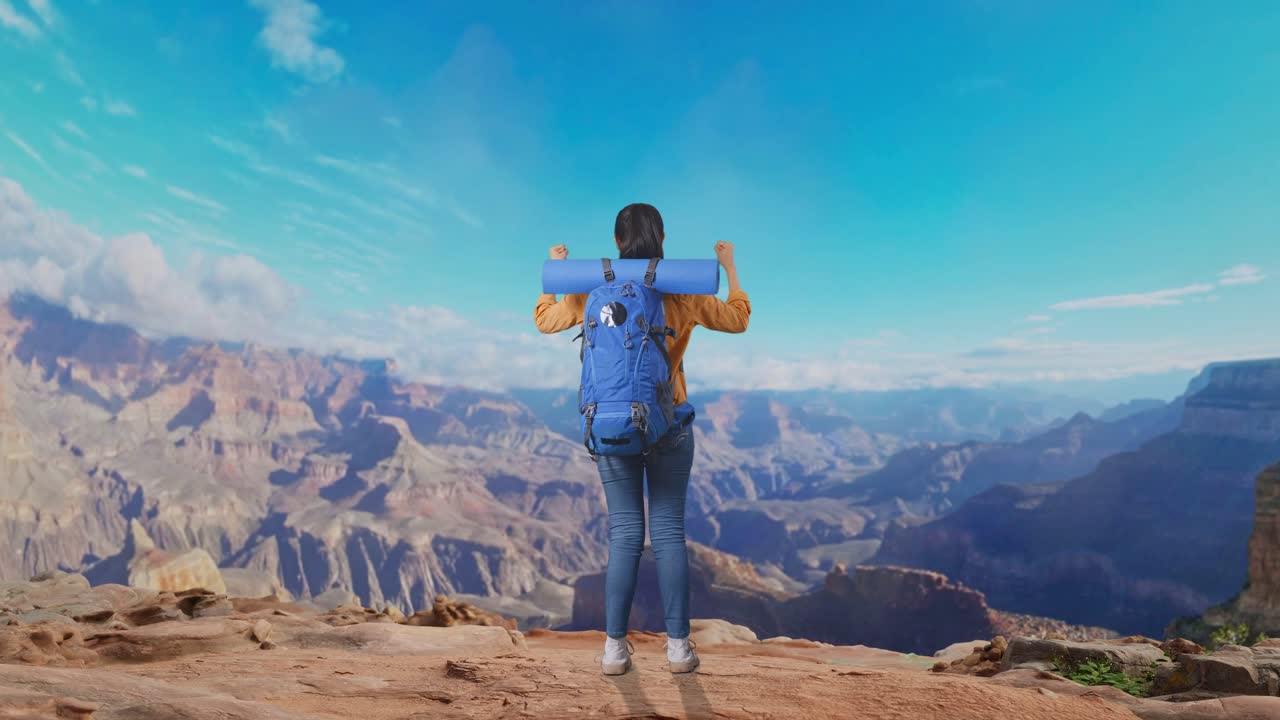 Full Body Back View Of A Female Hiker With Mountaineering Backpack Screaming Goal Celebrating The Success While Traveling At The Top Of Mountain
