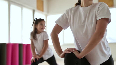 teacher and girls in dance class