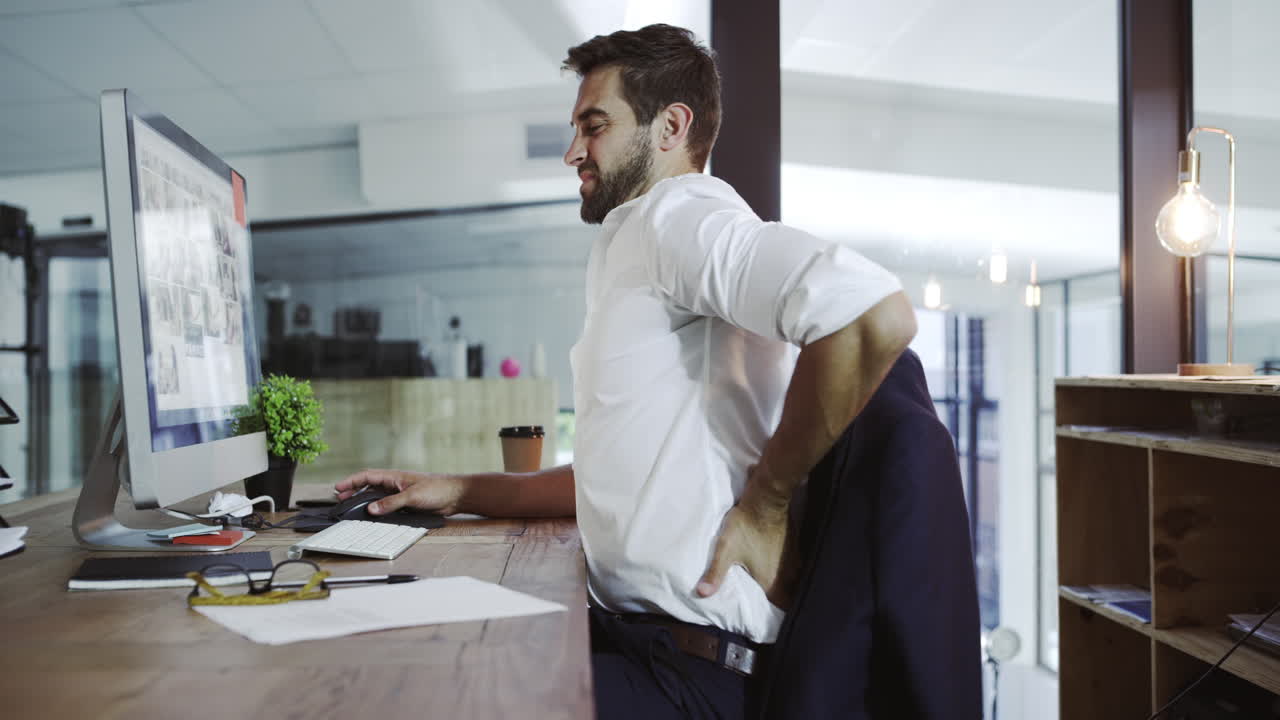 Feeling the pain and strain of working so hard | Premium Stock Video ...