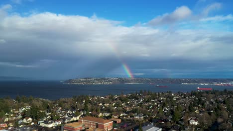 Beautiful bright rainbow over Tacoma City in Washington State - Aerial
