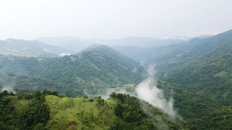 Drone-video-view-of-mountains-peaks-with-clouds-landscape