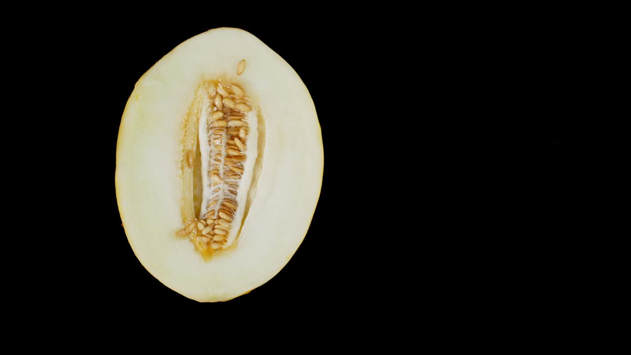 Half fresh melon rolling the water.