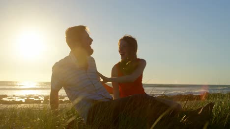 happy young couple having fun on the beach 4k