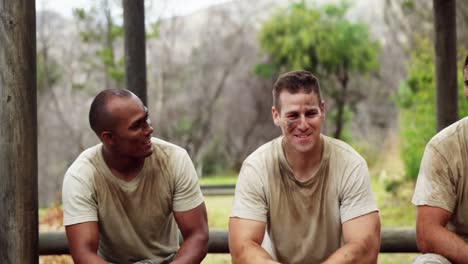 military troops relaxing during obstacle course 4k