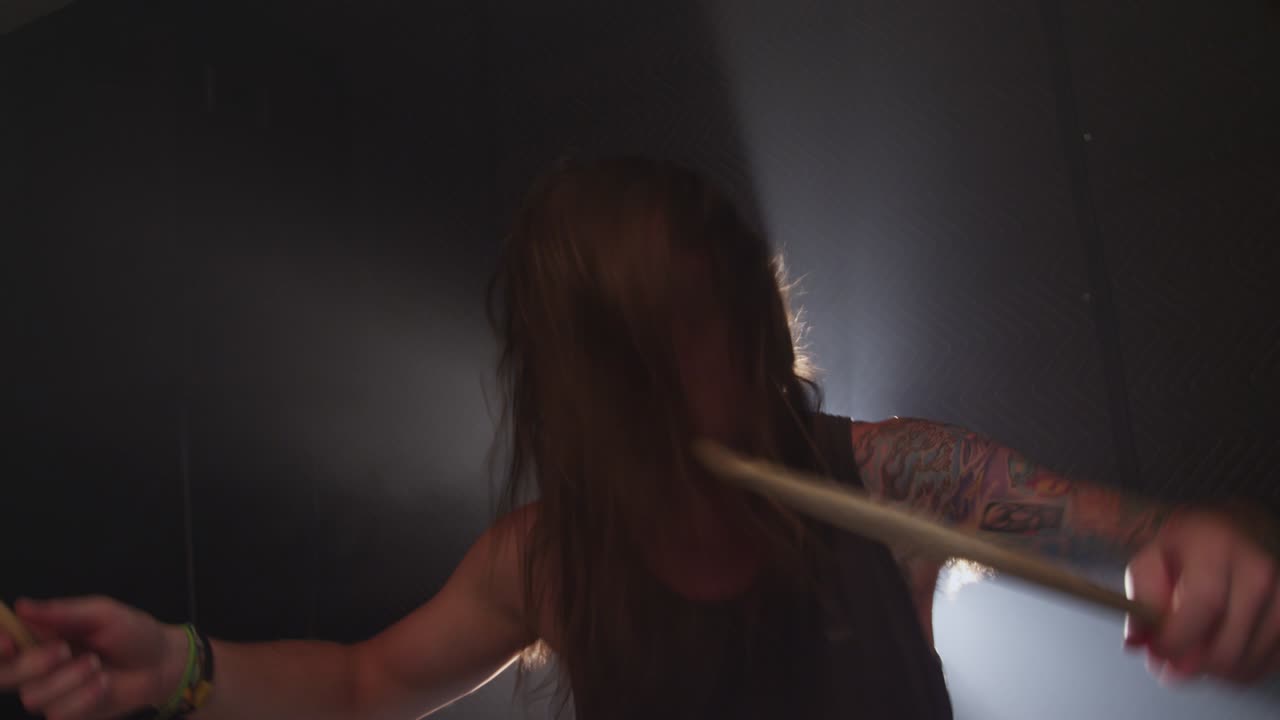 Man playing drums , slow motion