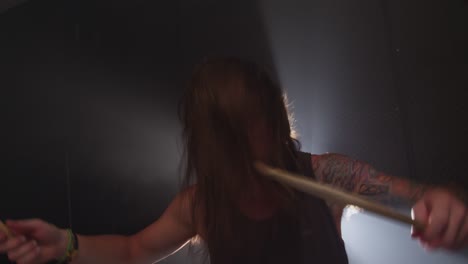 man playing drums , slow motion