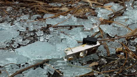 slide over broken safety glass with twigs and debris mixed in