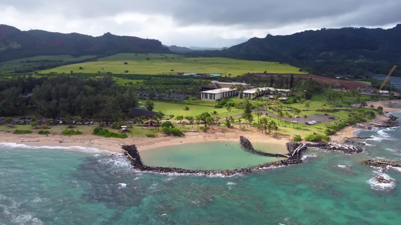 Lydgate Beach park near Wailua bay in Kauai. Holiday in paradise. man made two large tide pools created by lava rock for safely swimming snorkeling