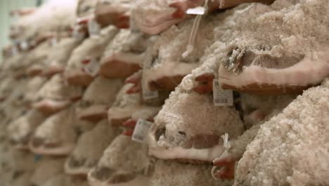 jamon serrano pig legs factory hanging in a industry. iberian ham elaboration process