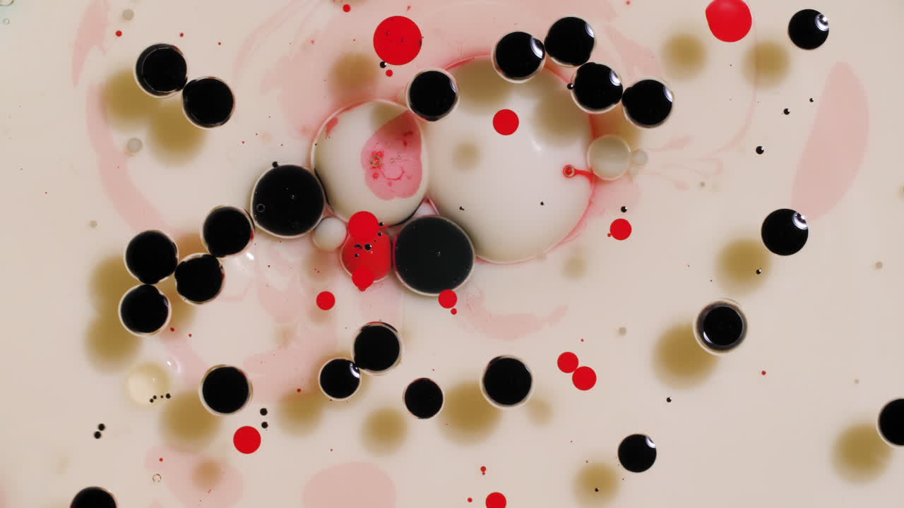 Red and cream colored acrylic paint mix, abstract fluid art background with Valentine's Day color scheme