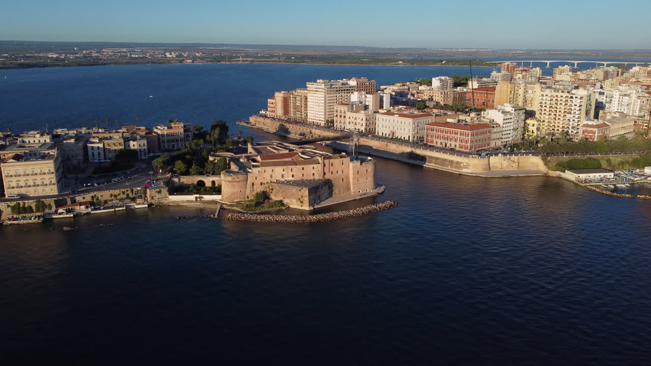 Taranto City at Mediterranean Sea Aerial View at Sunset