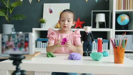 Cute Girl Playing with Play-Doh