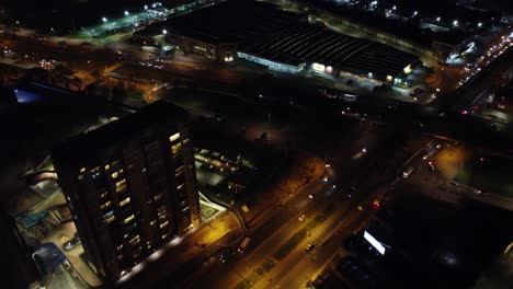 a steady droneshot flying over buildings and crossroads in the city of bogota, colombia