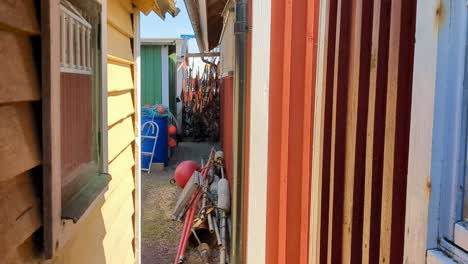 4k 60fps commercial fishing equipment outside fishing shacks in sweden