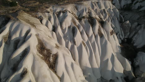 cappadocia hot air balloons flying over hills during sunset