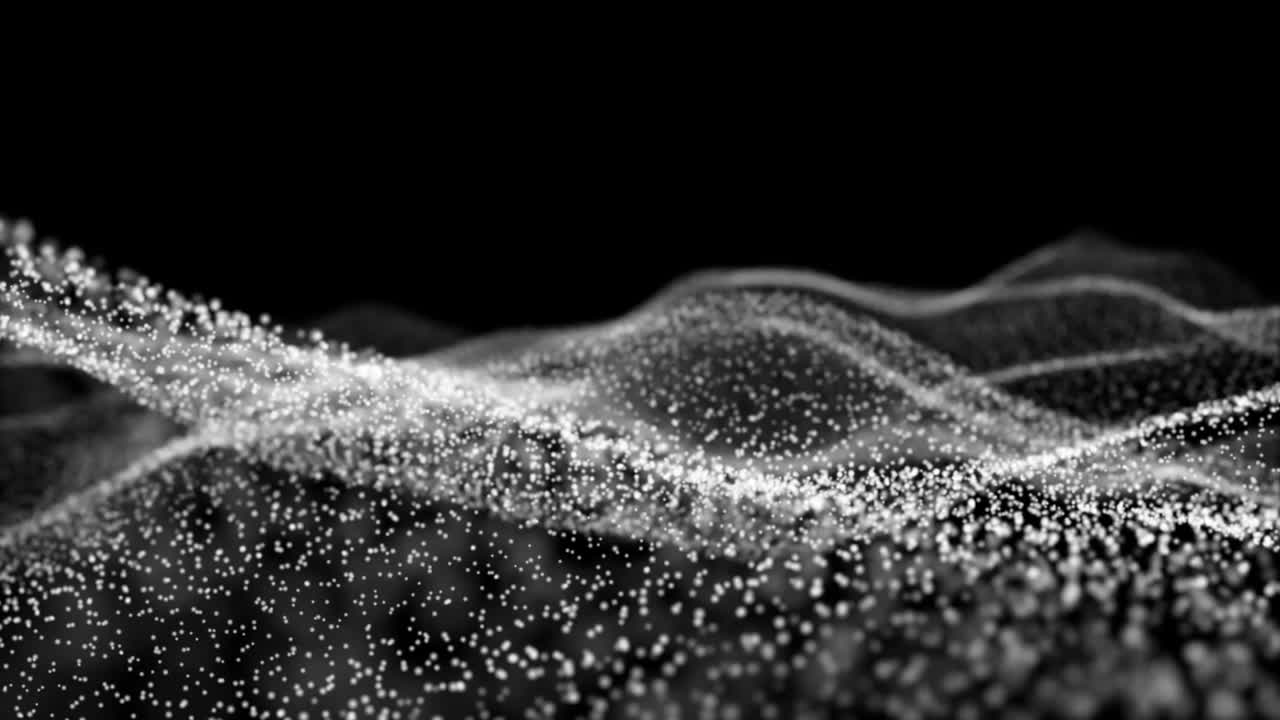 A digital wave of white particles flows and undulates with shallow focus. A seamless loop for technology, science, or abstract motion backgrounds