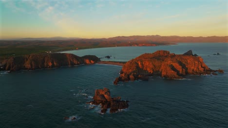 sunset light over playa la morita in tenacatita, jalisco, mexico. aerial drone shot