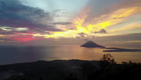 drone zoom over hiker of monado tua island in monado, indonesia