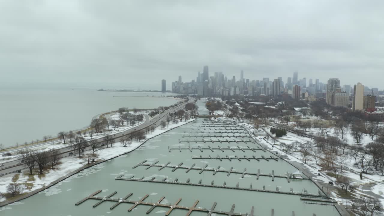 Aerial, Establishing Shot of Chicago on Cold Winter Day above Diversey Harbor