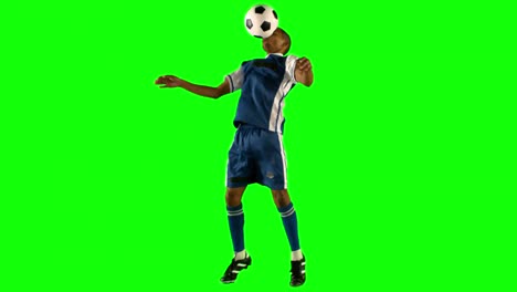 Football-player-chesting-the-ball-