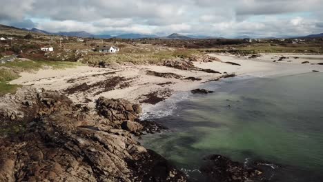 aerial panoramic view of clifden beach: rocks, sand in connemara, ireland