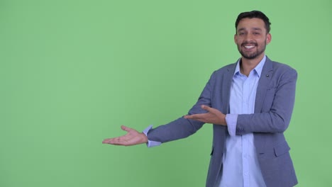 young handsome bearded persian businessman in suit