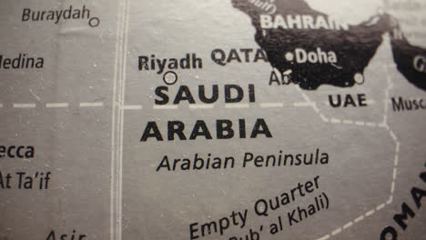 close-up of a globe showing saudi arabia and the middle east