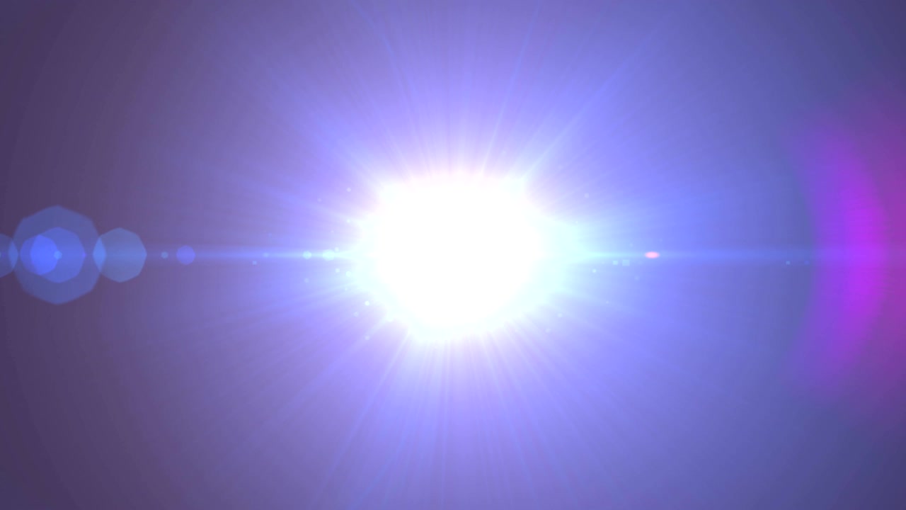 mancha azul brillante de luz que brilla contra un fondo azul