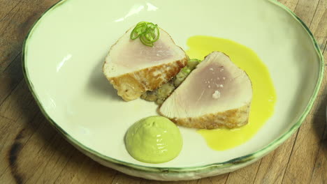 seared tuna with yellow sauce and green dip