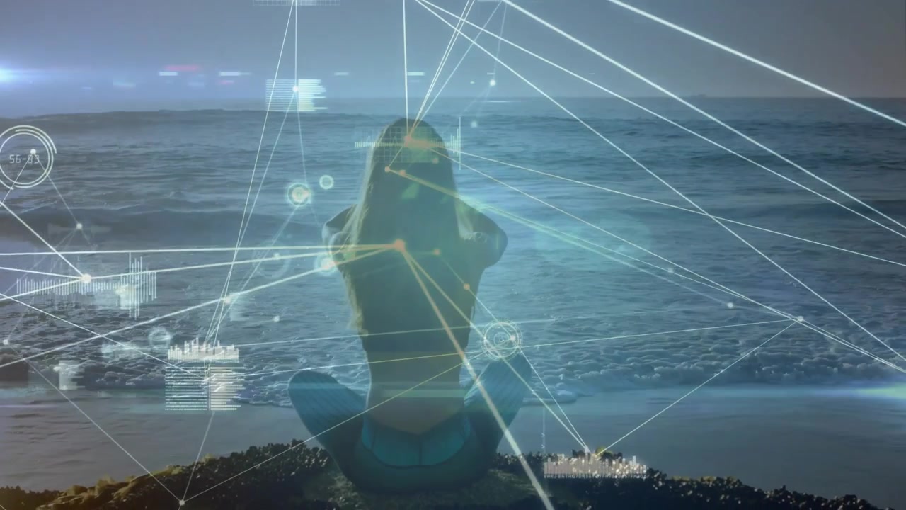 Mujer meditando en la playa con superposición de datos digitales