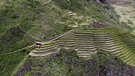 Sacred-Valley-With-Incan-Ruins-In-Towering-Mountain-Terraces-In-Pisac,-Cusco,-Peru