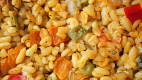 close-up of a bulgur dish with vegetables