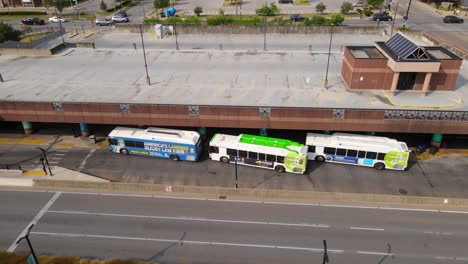 aerial view of a bus station and parking garage