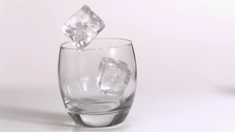 Ice-cubes-rolling-in-super-slow-motion-in-a-glass